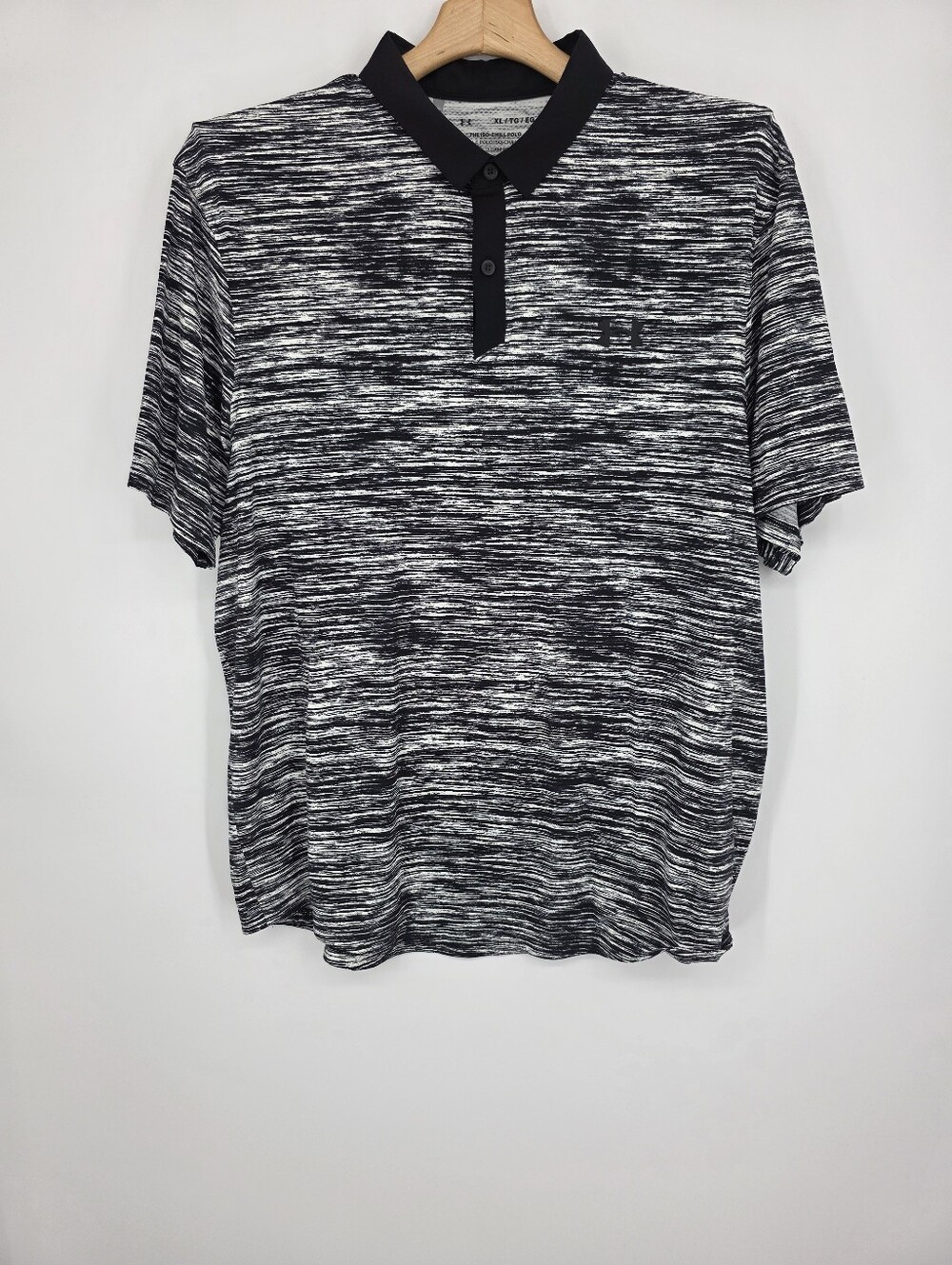 Under Armour black and white marbled polo shirt in XL.